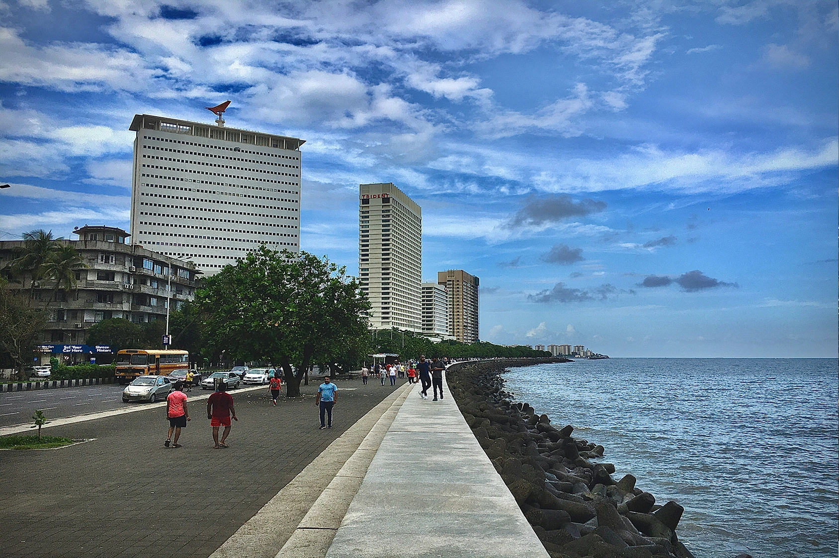 Walk along Marine Drive Visit the Gateway of India Explore vibrant neighborhoods like Bandra and Colaba Experience India's financial and entertainment capital